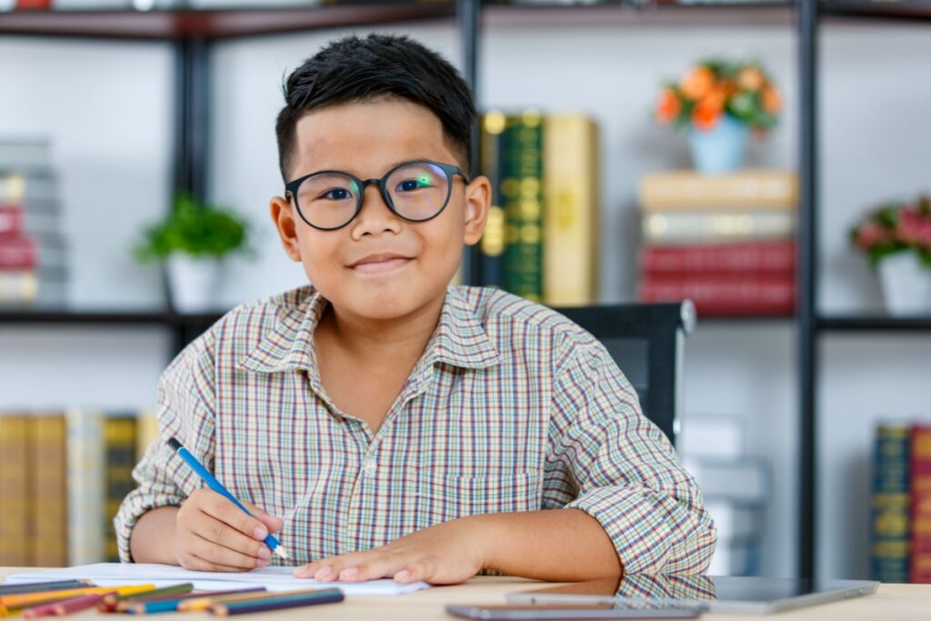 A child wearing myopia control glasses